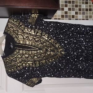 Dashiki printed T-shirt black with gold and white splatters size small.